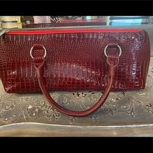 I bought this for my curling wand but it’s actually a wine bag…